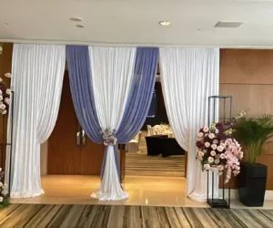 Decorated entrance with floers and curtains of an event_BlvdChangi