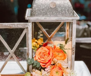 A decorative lantern centerpiece with flowers_BlvdChangi