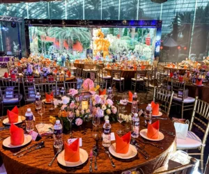 Dining tables in the banquet decorated with flowers & Candles_BlvdChangi