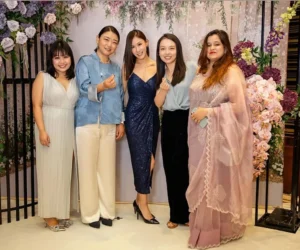A group of women posing for pictures_BlvdChangi