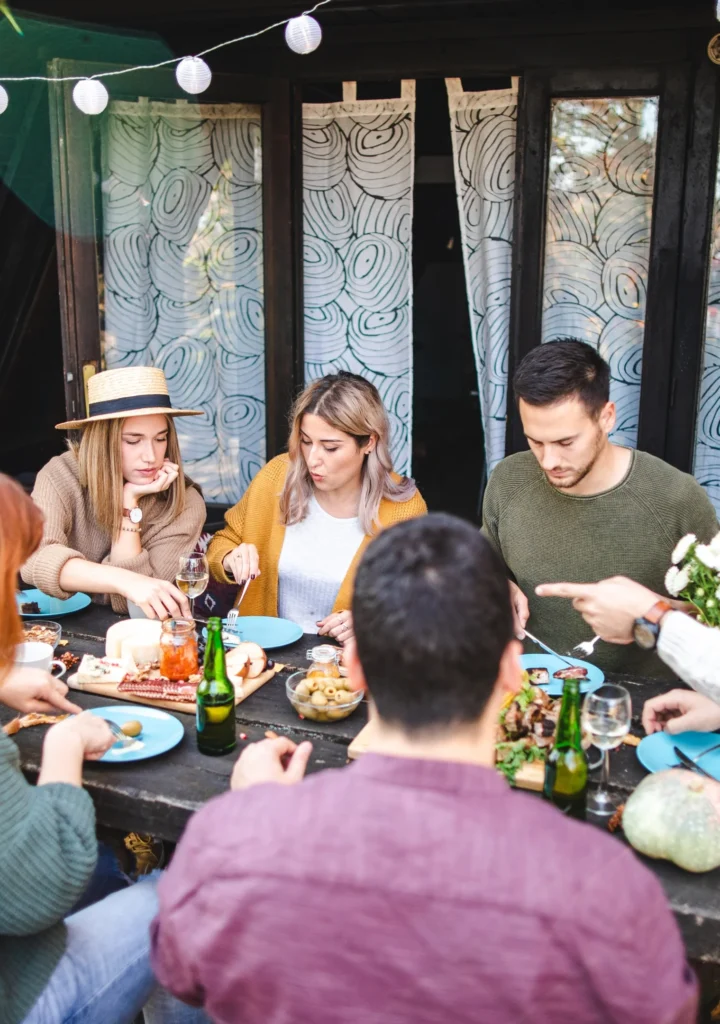A group of people dining together_BlvdChangi
