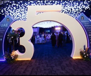 People gathered in a hall with bright blue lighting_BlvdChangi