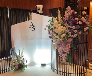 A decorated area with a large floral centerpiece_BlvdChangi