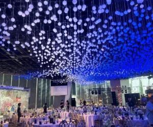 A hall with blue lighting and a starry ceiling_BlvdChangi