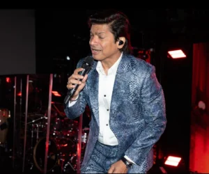A man singing on stage with a mic_BlvdChangi