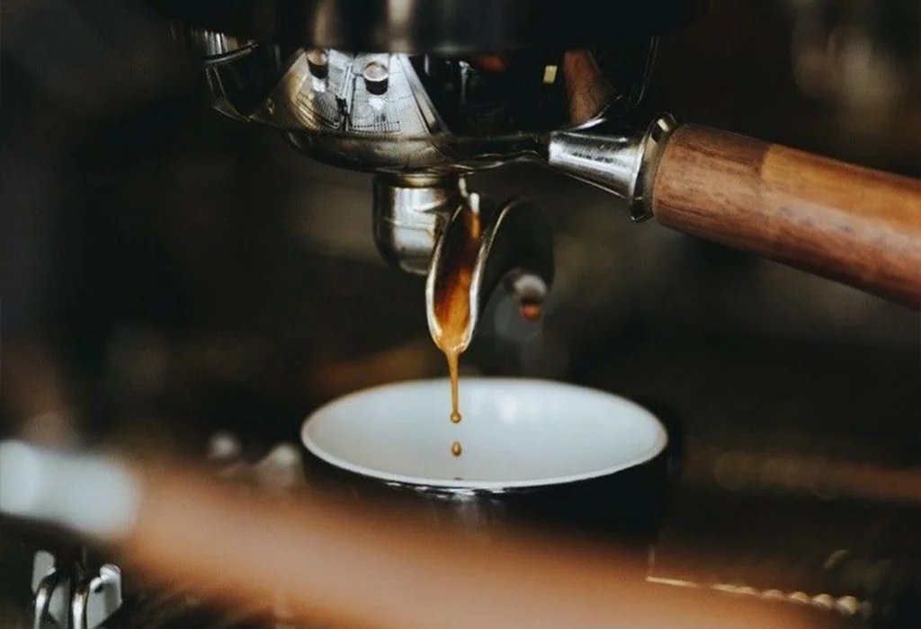 Barista preparing espresso using Slayer X Coffee Machine at BLVD Changi, Singapore